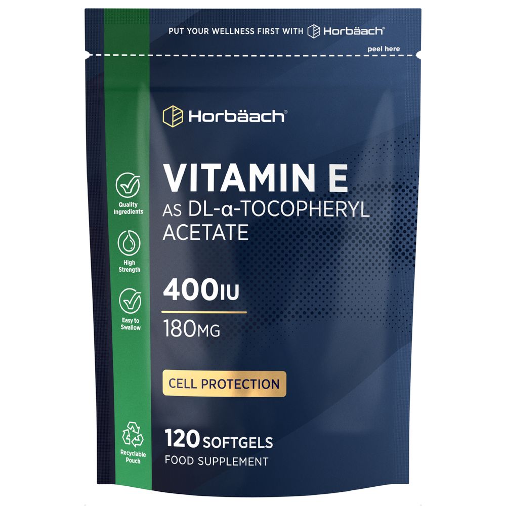 Horbäach Vitamin E 400IU, containing 120 softgels, shown with softgels on a hand scale for size reference.