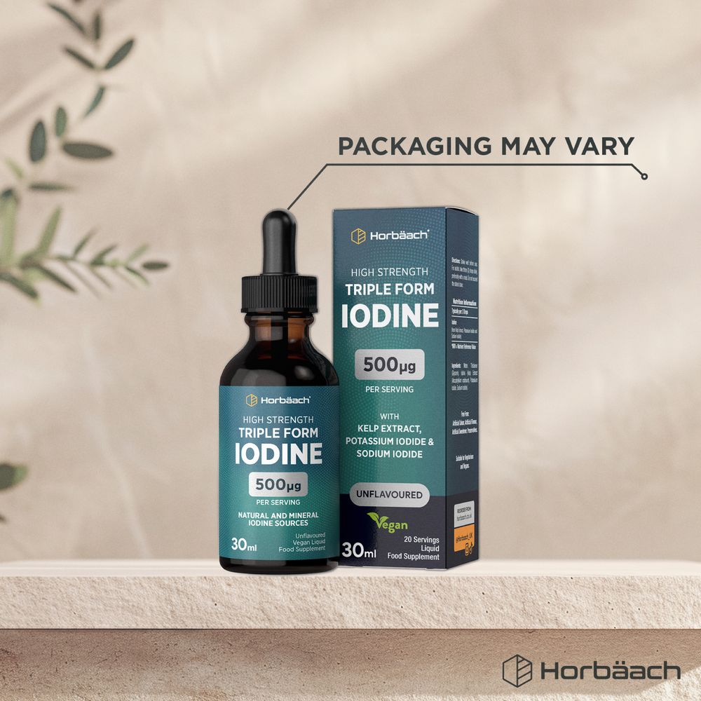 Horbäach Triple Form Iodine liquid, 30ml bottle, 500µg per serving, shown on hand scale to depict size and volume.