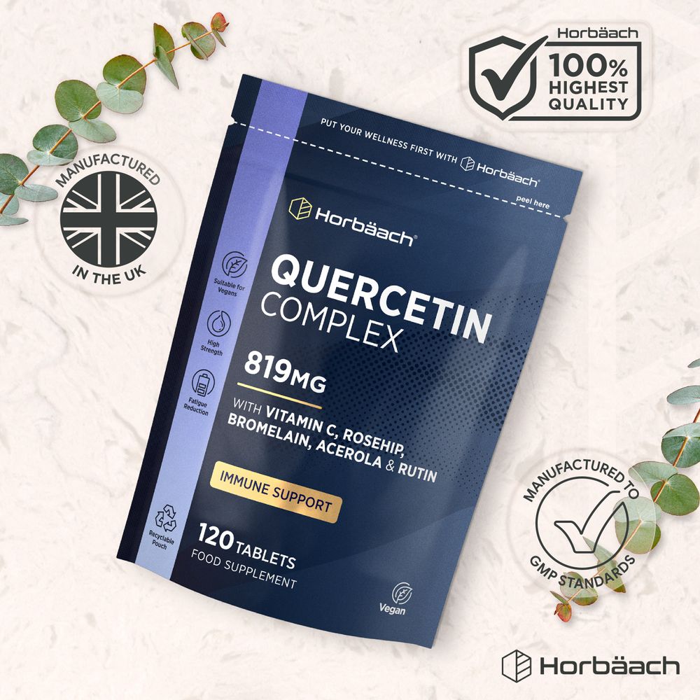 Hand holding a bottle of Quercetin Complex 819mg with 120 vegan tablets, showing the label for dietary supplement information.