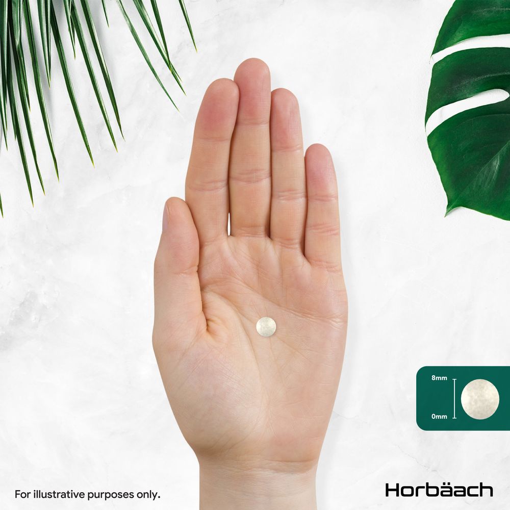 A hand holds a single round tablet. A graphic indicates dimensions of 8mm and 0mm. Text states 'For illustrative purposes only'.