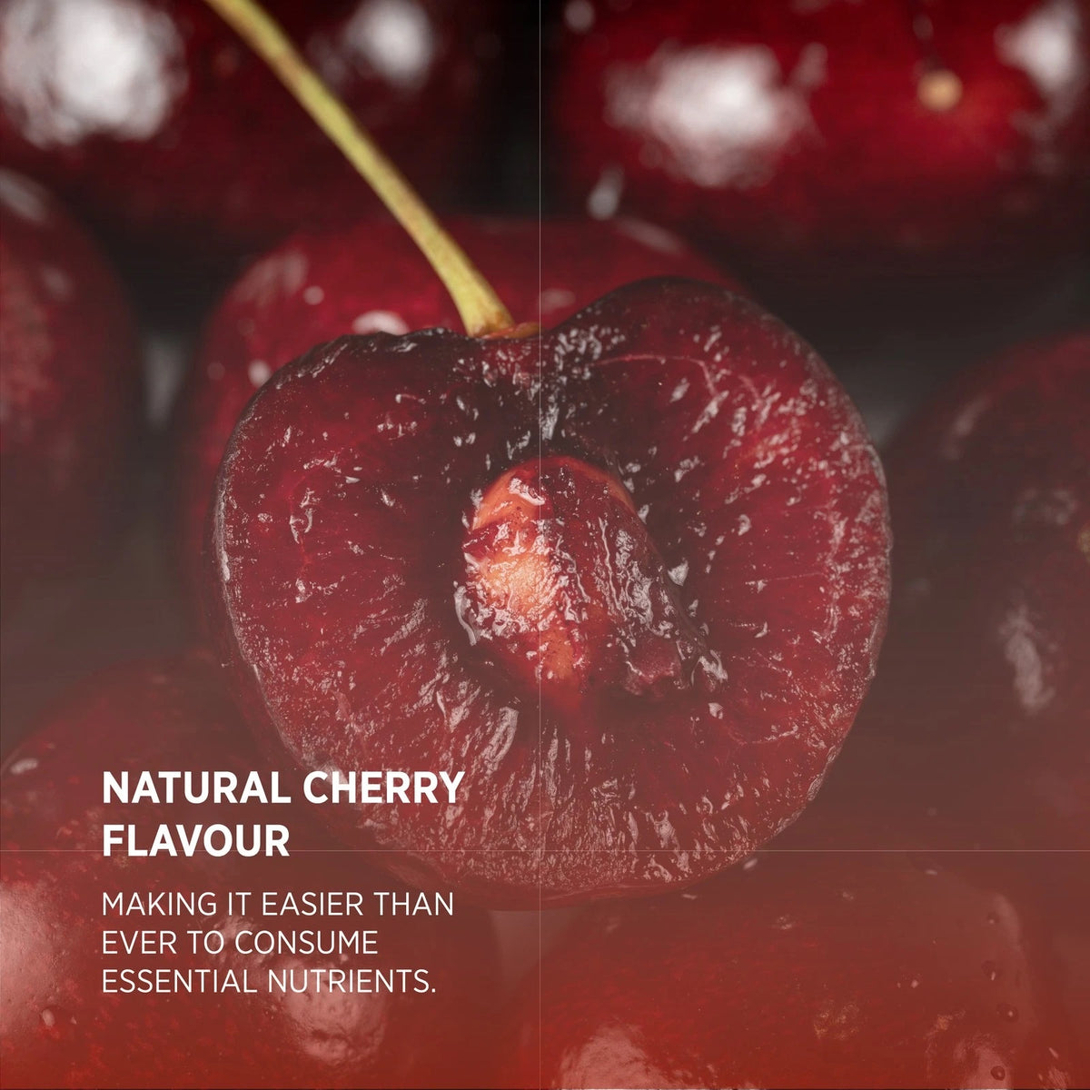 Cherry cut in half, surrounded by whole cherries. Text: NATURAL CHERRY FLAVOUR. Making it easier to consume essential nutrients.