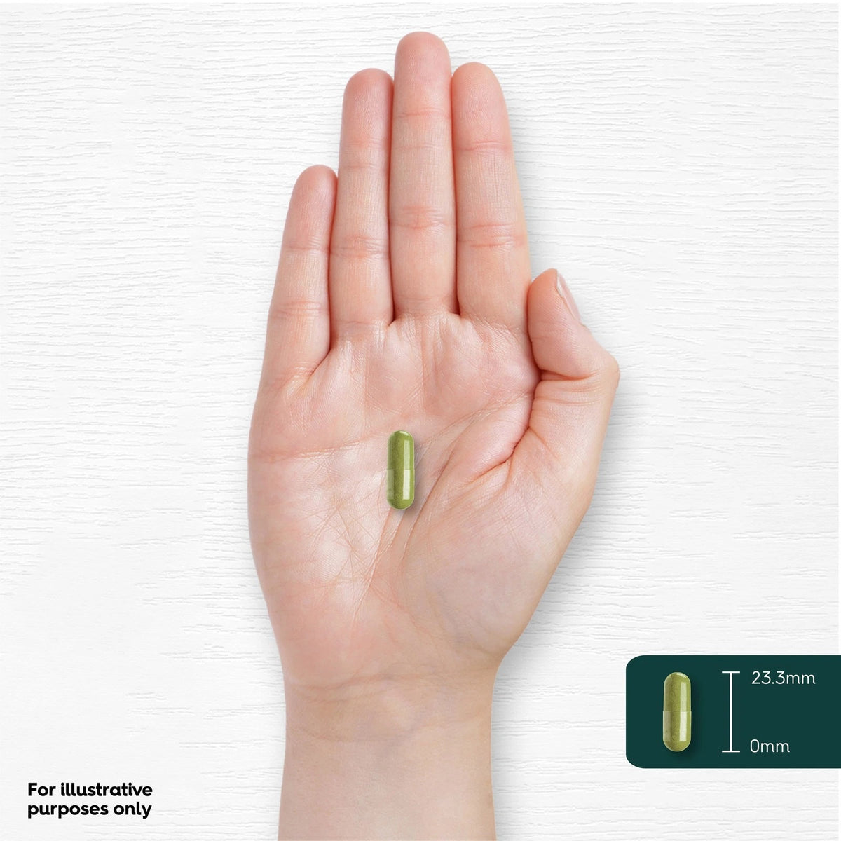 A green vegan capsule measuring 23.3mm in length.