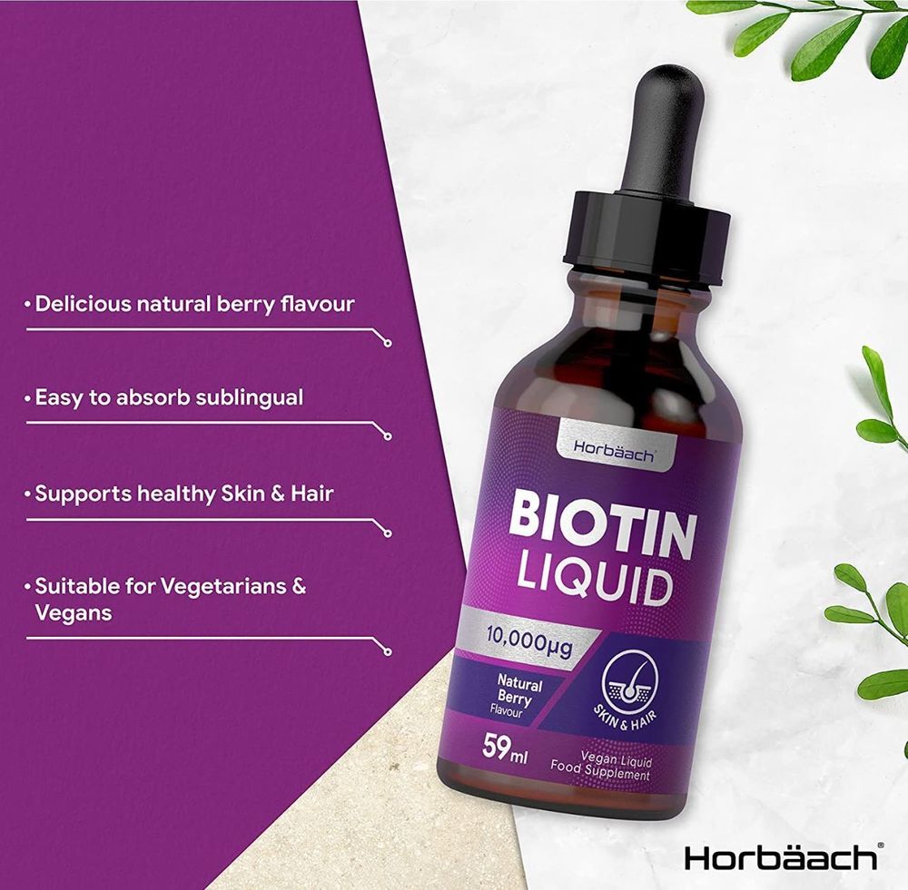 A 59ml bottle of Biotin Liquid with 10,000µg potency, shown on a hand for scale.