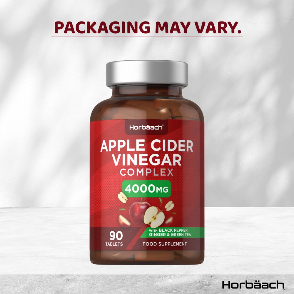 Apple Cider Vinegar Complex 4000mg, 90 tablets in a bottle, displayed on a hand scale for accurate weight measurement.