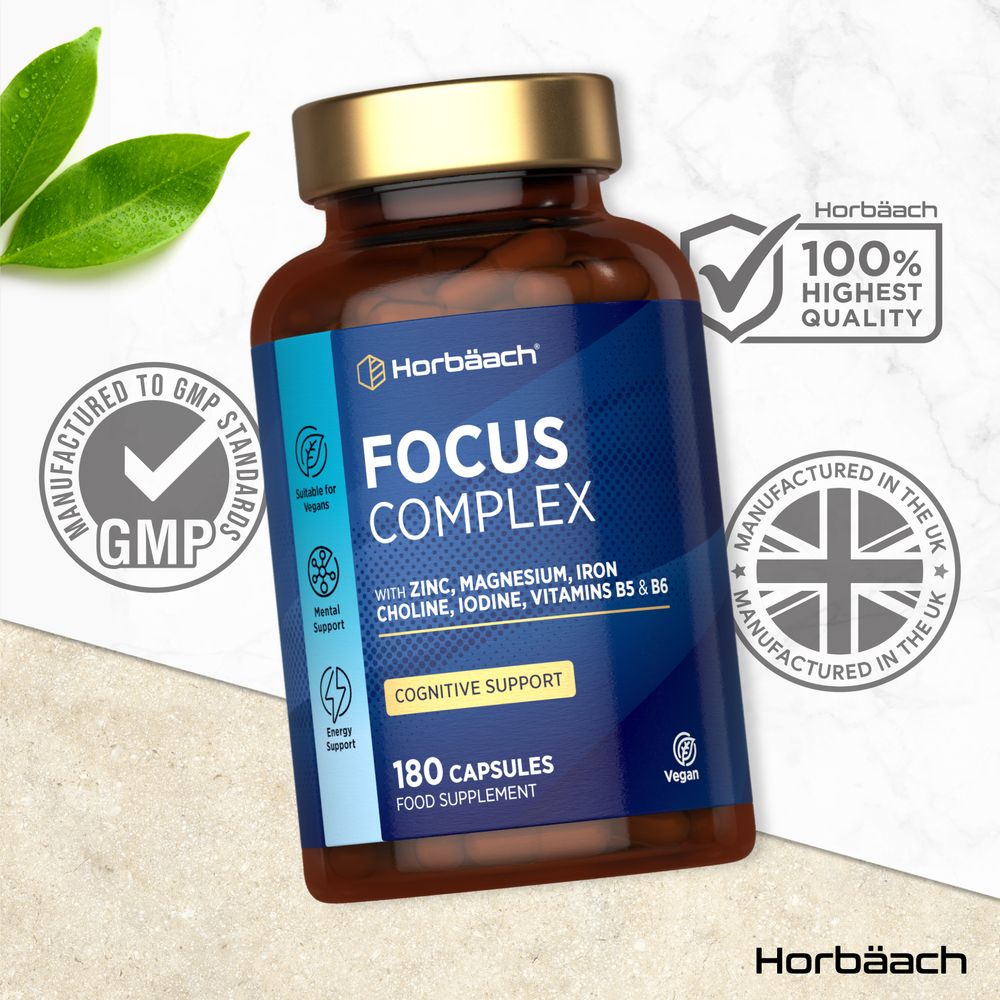 Horbäach Focus Complex bottle containing 180 capsules, positioned on a hand for scale.