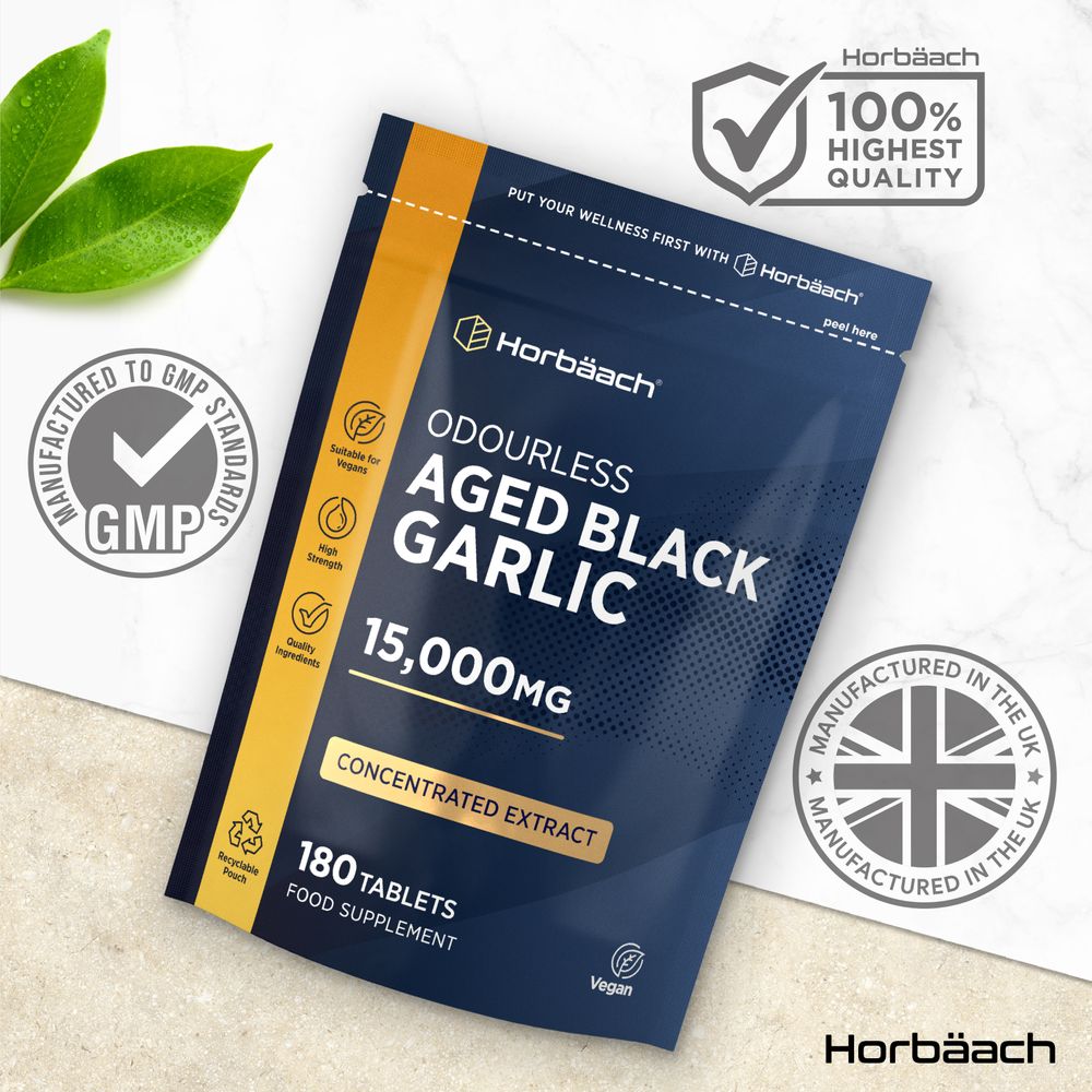 A pouch labeled Odourless Aged Black Garlic 15,000MG containing 180 tablets, shown in a dark blue color.
