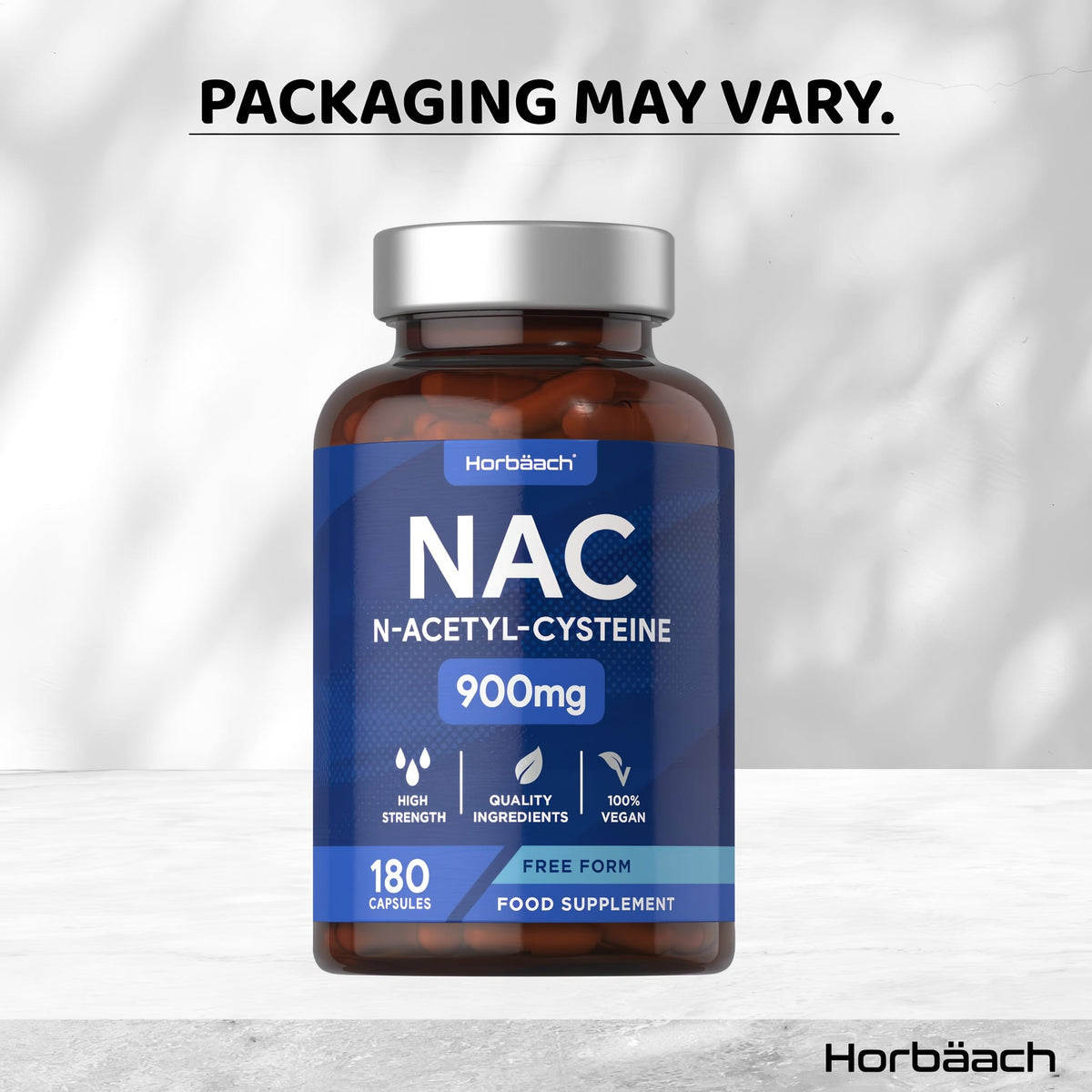 NAC N-Acetyl-Cysteine supplement with 900mg per capsule, available in a bottle of 180 capsules, shown on a hand scale.