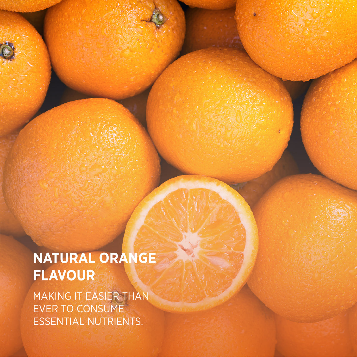 HU Adult Multivitamin & Probiotic Gummies. Fresh oranges, one sliced. Text: 'NATURAL ORANGE FLAVOUR'.