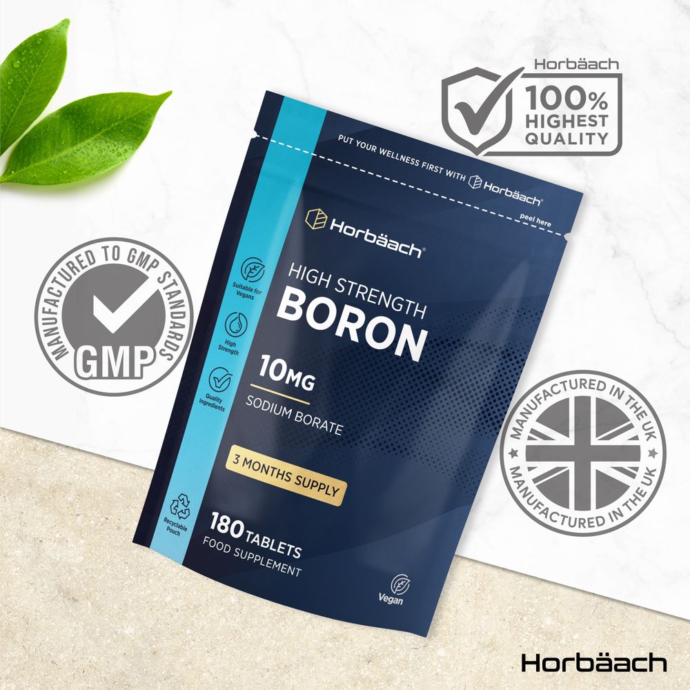 Horbäach High Strength Boron 10mg 180 Vegan Tablets Food Supplement shown on a scale in hand.