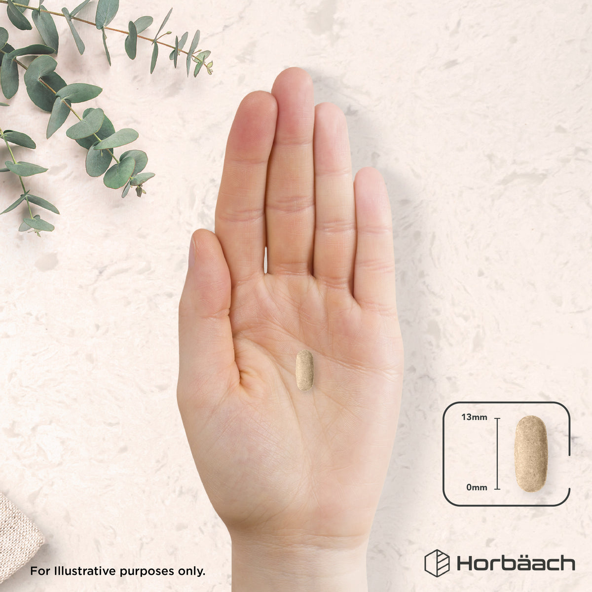 A 13mm long tablet rests in the palm of a hand, accompanied by a diagram indicating the tablet's length.