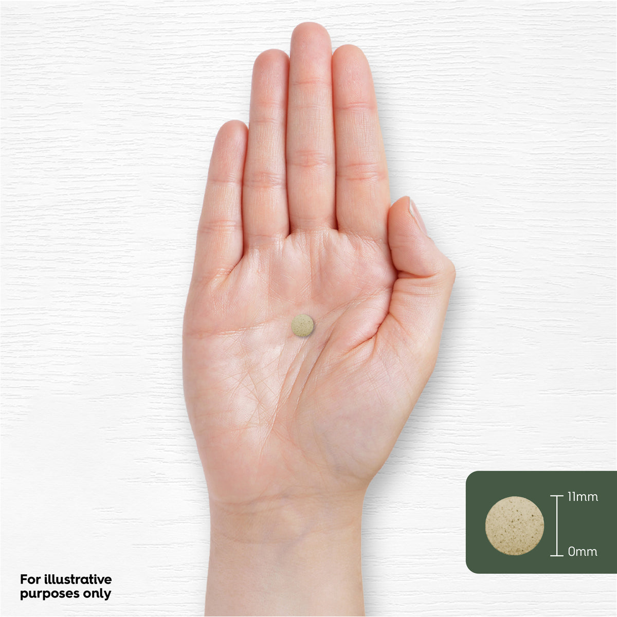 A hand holds a round tablet, featuring a graphic that shows its diameter as 11mm.