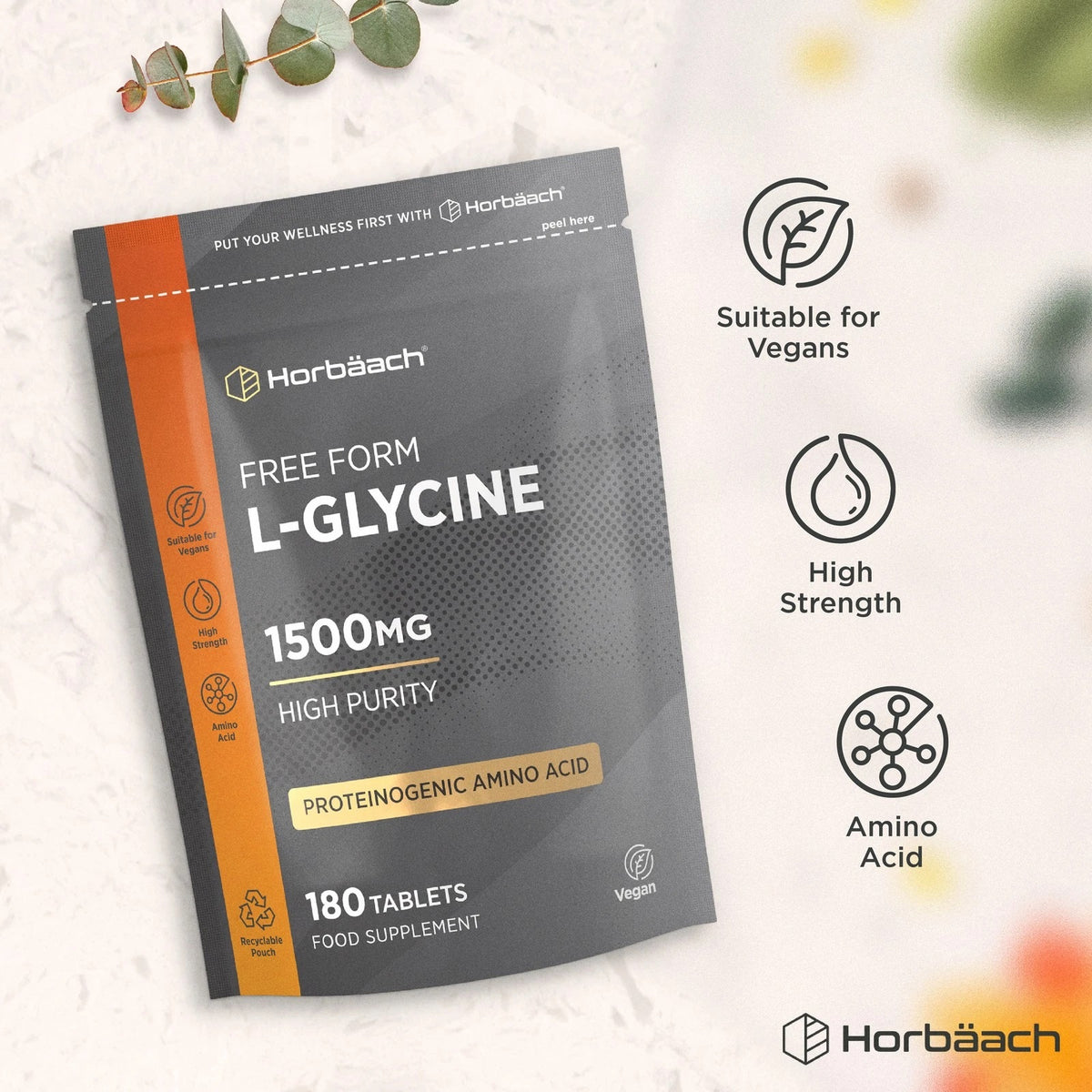 Free Form L-Glycine 1500mg supplement, 180 vegan tablets in a recyclable grey and orange pouch.