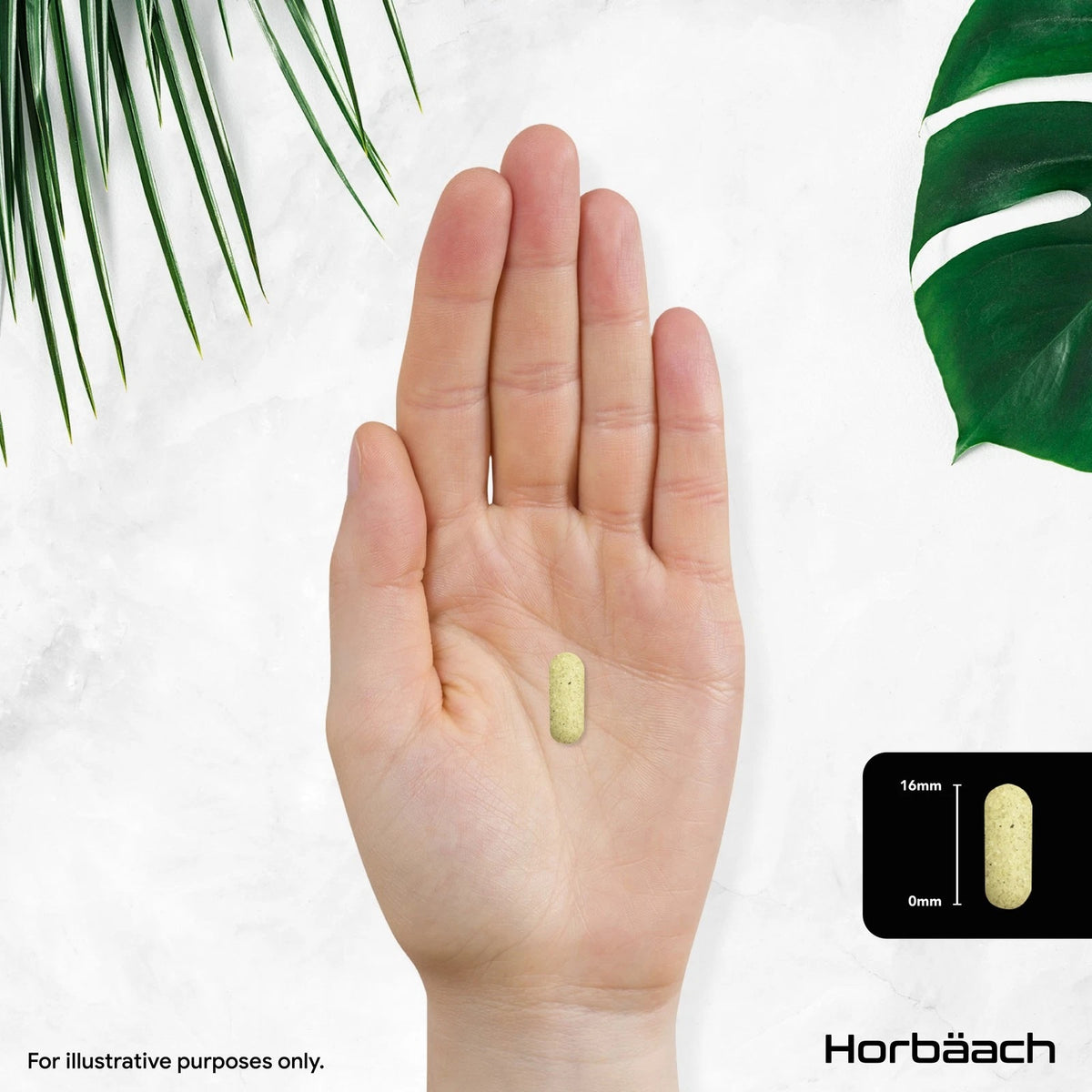 A light green speckled tablet is held in a hand, showing its length measurement as 16mm.