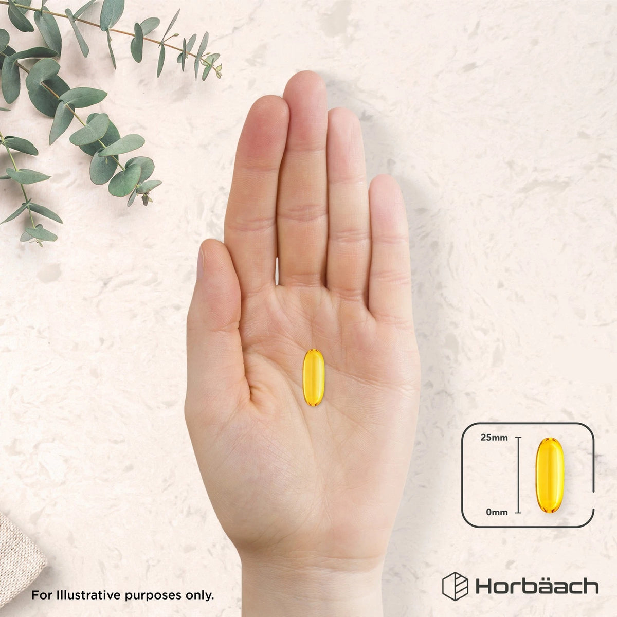 A yellow softgel in a human palm, accompanied by an illustration indicating its length is 25mm.